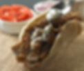 Delicious gyro with tzatziki sauce